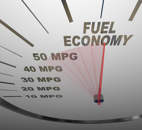 A gauge indicating fuel economy, displaying measurements from 10 MPG to 50 MPG. A red needle points towards the 40 MPG mark. The words "Fuel Economy" are prominently displayed above the needle. The gauge is designed in a metallic style with a silver background.